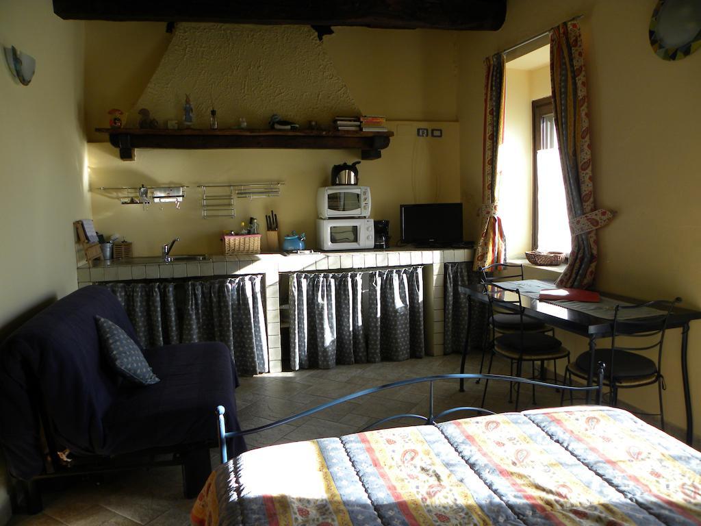 Agriturismo Fano'S Farm Suno Pokoj fotografie