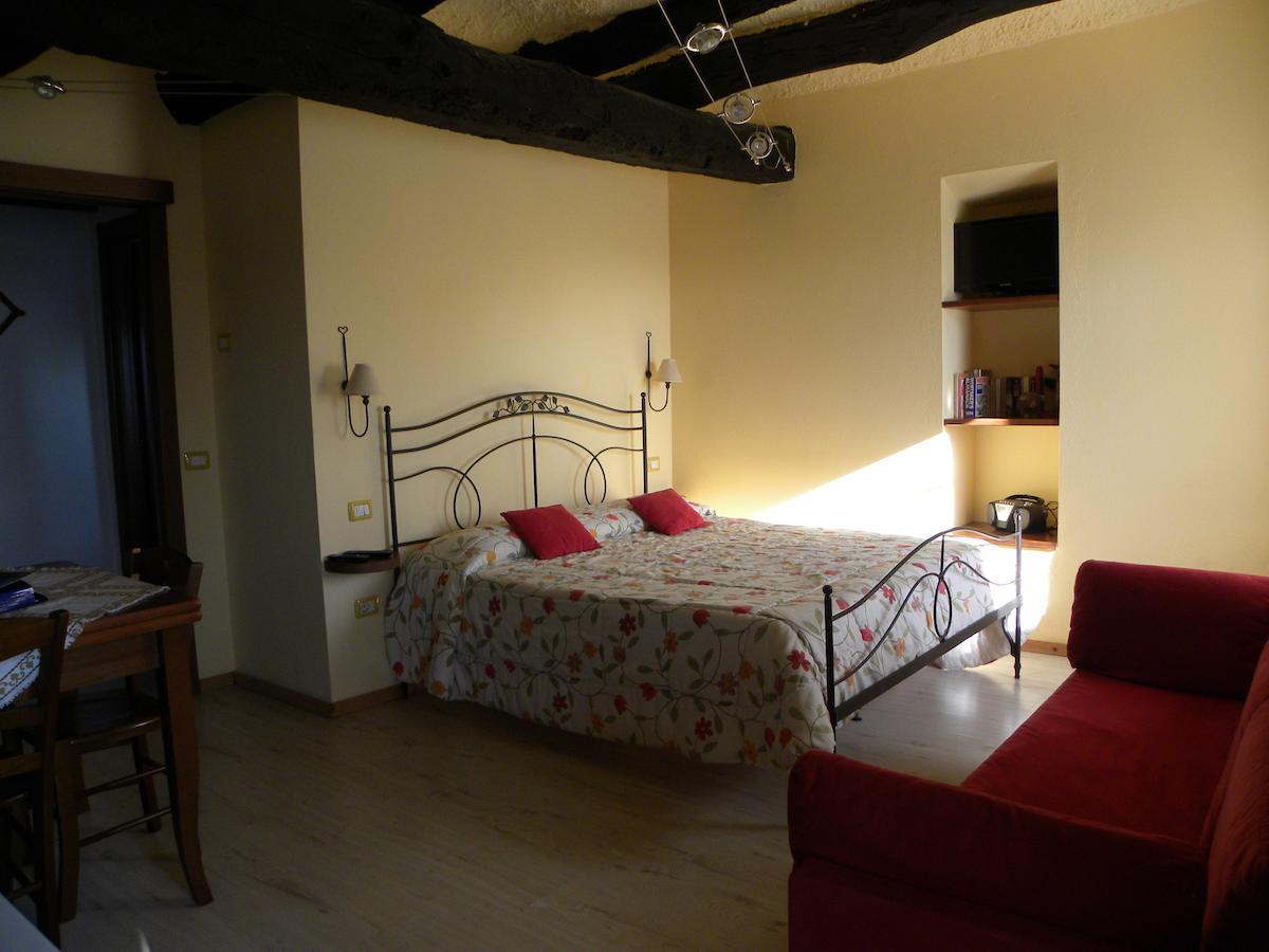 Agriturismo Fano'S Farm Suno Pokoj fotografie